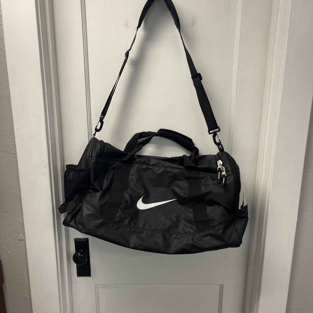 Train in Style" - Nike Brasilia Black Duffel with Adjustable Strap